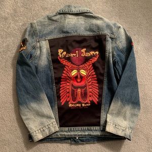 Men’s denim jacket with patches.